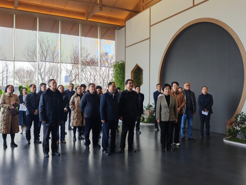 区人大常委会领导朱明福等接待宝山区来青学习考察