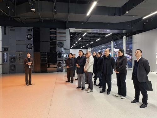 区人大常委会主任程巍接待市人大教科文卫委主任委员程向民一行来青调研