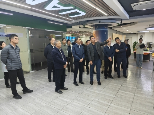 区人大常委会主任程巍等接待市人大常委会副主任滕建勇一行来青调研